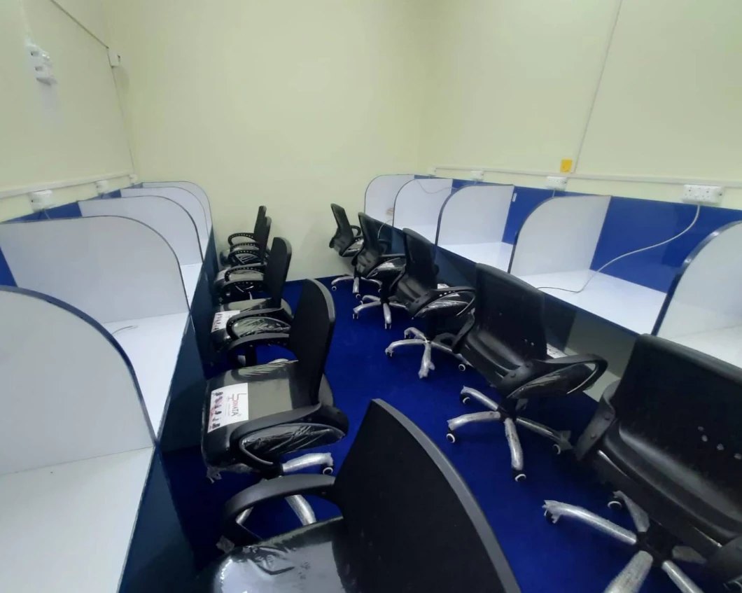 Study cabins with comfortable chairs and blue carpet